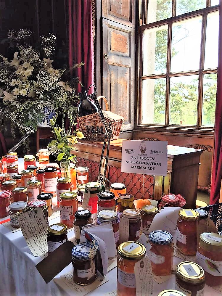 Marmalade display at the festival with the gardens behind