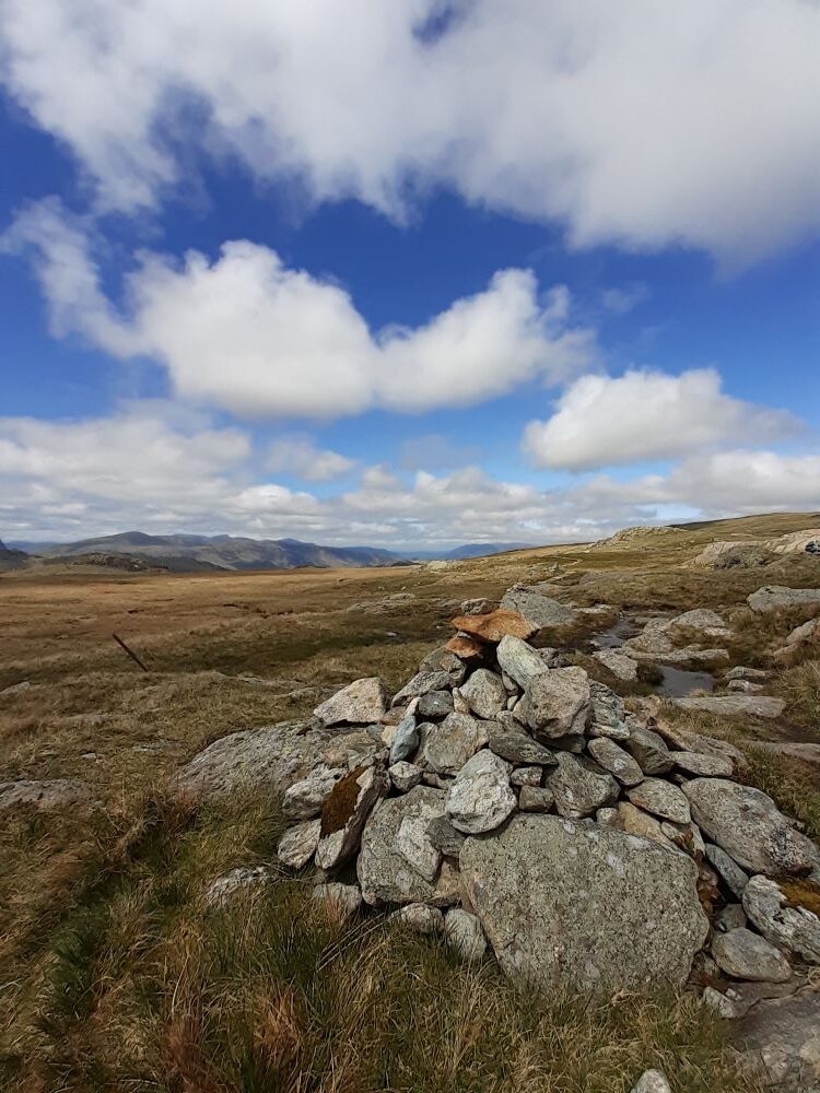Cairn under a blustery sky at Greenup
